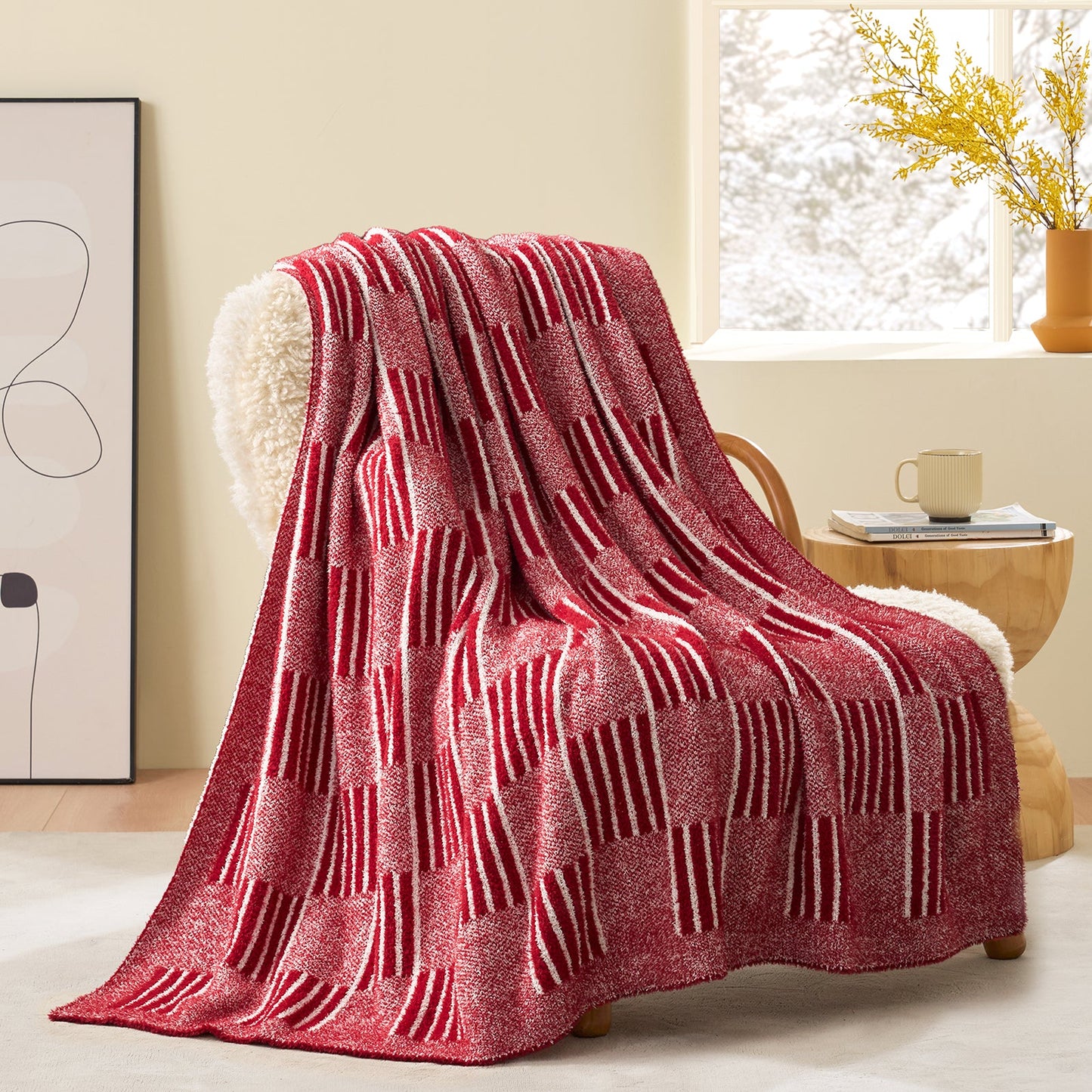 Reversible Heather Checkered Feather Yarn Throw Blanket in Red draped over an armchair, showcasing its bold color and checkered design. #color_Red
