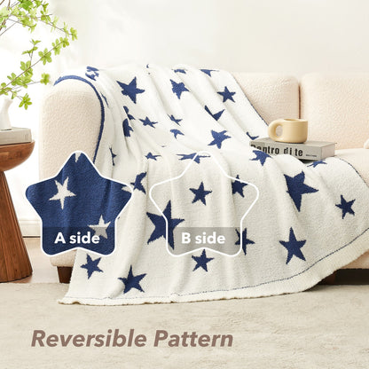 Reversible Star Feather Yarn Knit Throw Blanket in Heather Royal Blue draped over a sofa, featuring a dual-sided star pattern for versatile styling and cozy comfort. #color_Heather Royal Blue