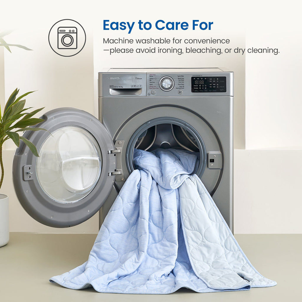 Cool Blue Cozy Bliss dual-sided cooling comforter in washing machine, machine washable and easy tto care.  #color_Cool Blue