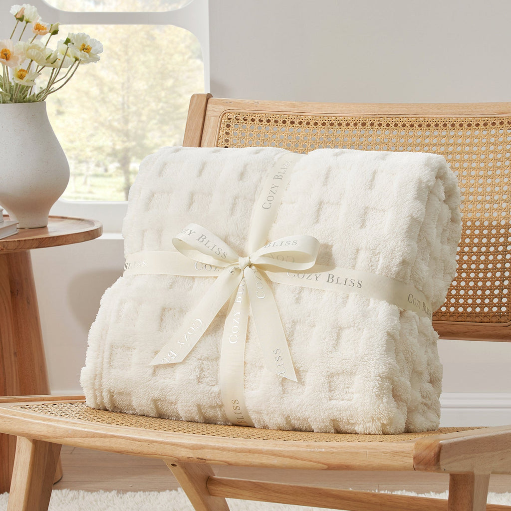Checkered waffle shaggy sherpa throw blanket in Ivory folded with ribbon, perfect for gifting #color_Ivory