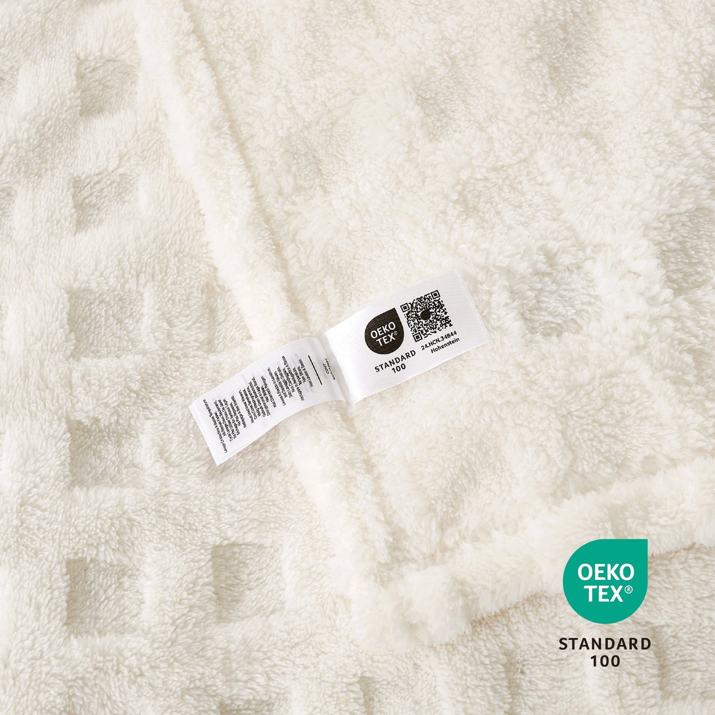 Close up of checkered waffle shaggy sherpa throw blanket in Ivory, showcasing soft texture and OEKO TEX STANDARD 100 certification #color_Ivory