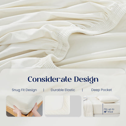 White fitted sheet with text highlighting snug fit, durable elastic and deep pocket design.#color_Ivory