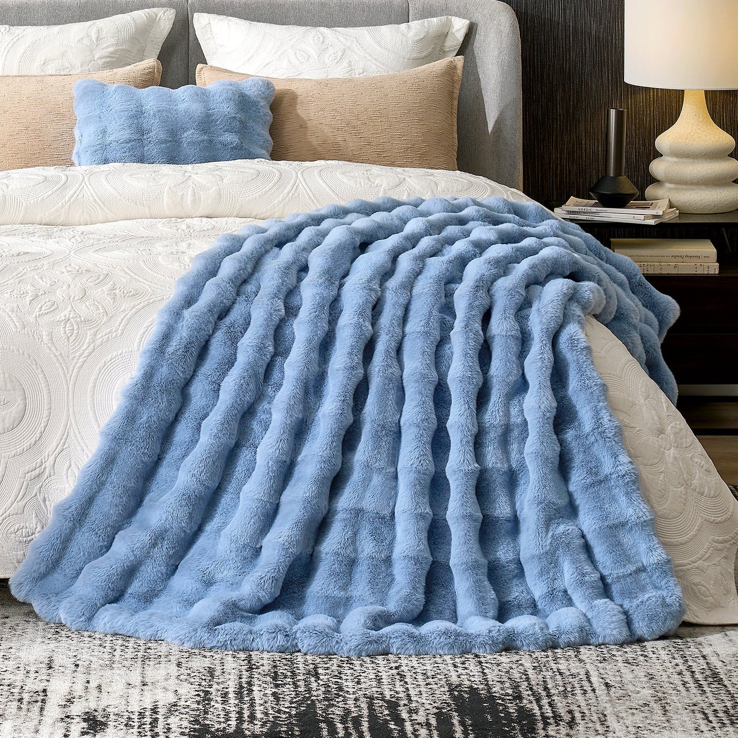 Misty blue faux fur throw blanket on bed. Cozy and soft blanket for bedroom comfort #color_Misty Blue