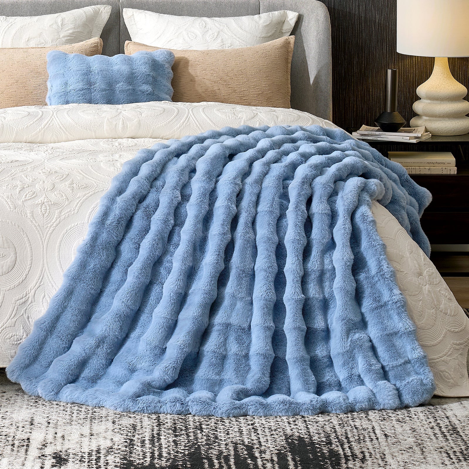 Misty blue faux fur throw blanket on bed. Cozy and soft blanket for bedroom comfort #color_Misty Blue