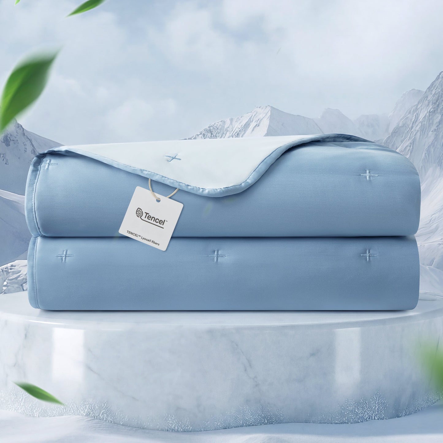Stack of blue blankets with a tag on a snowy mountain background.#color_Dark Blue