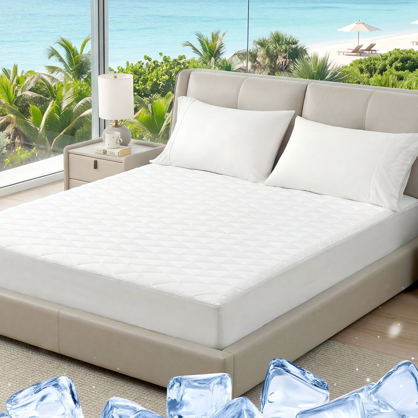 Bed with white mattress cover and pillows in a room with a view of greenery. #color_Off White