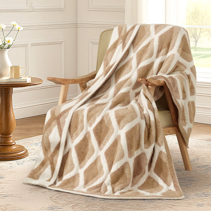 Diamond Feather Yarn Throw Blanket in Beige draped over an armchair, showcasing soft feather yarn texture and diamond pattern design. #color_Beige