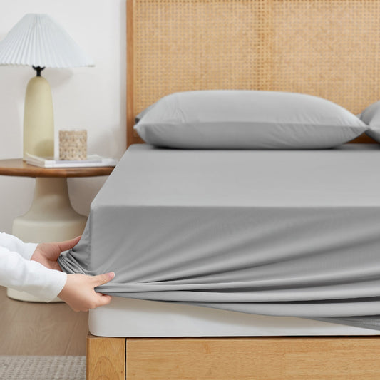 Cozy Bliss Cream-colored cooling fitted sheet set with pillowcases front view. #Color_Light Grey