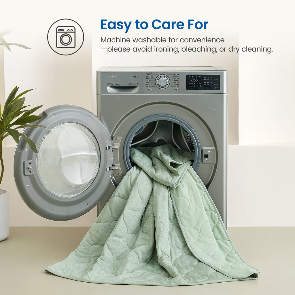 Sage green Cozy Bliss dual-sided cooling comforter in washing machine, machine washable and easy tto care.  #color_Sage Green