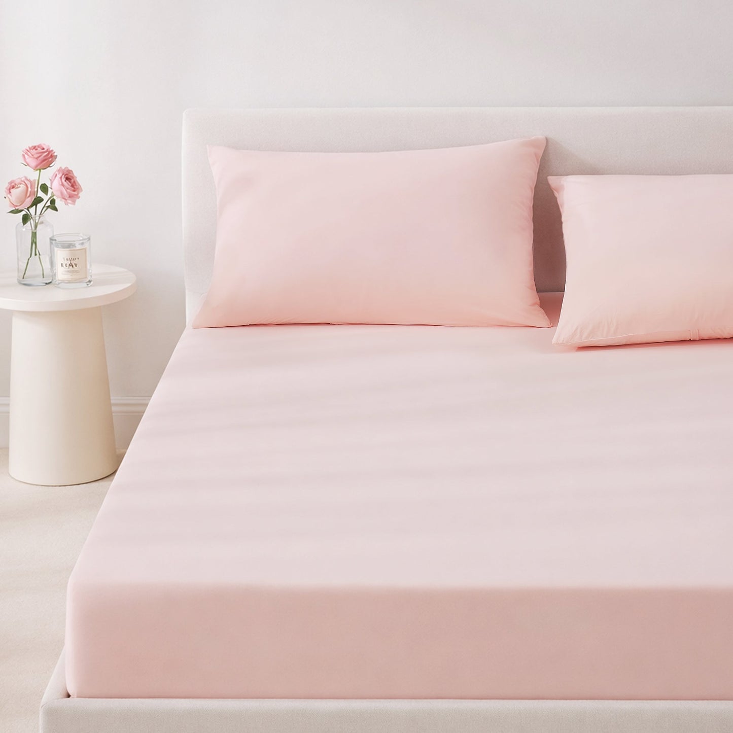 Pink cooling bedding set on a bed in a minimalistic bedroom setting.#color_Pink