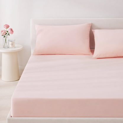 Pink cooling bedding set on a bed in a minimalistic bedroom setting.#color_Pink