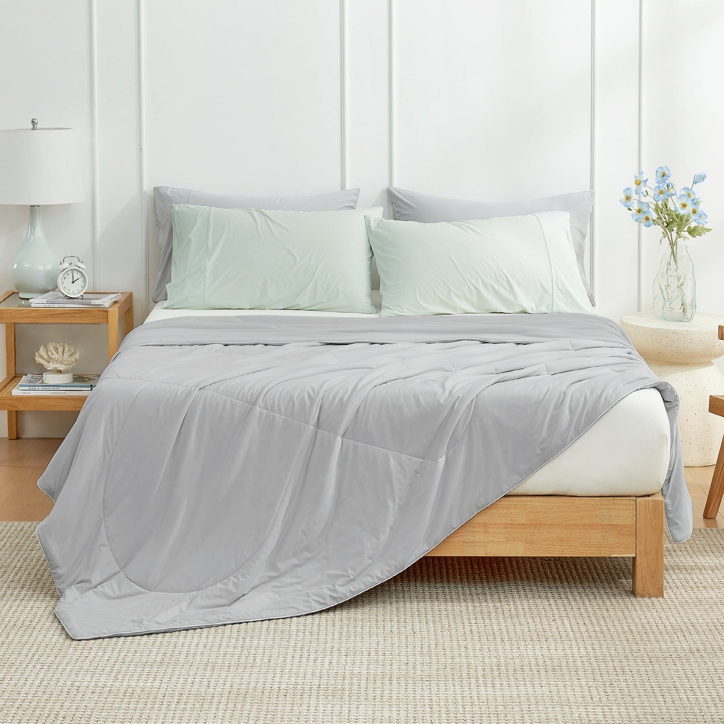 Cozy Bliss grey cooling blanket on bed, modern bedroom. #Color_Light Grey