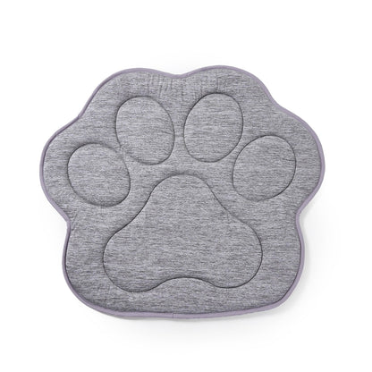 Gray paw-shaped mat on a white background.#color_Grey