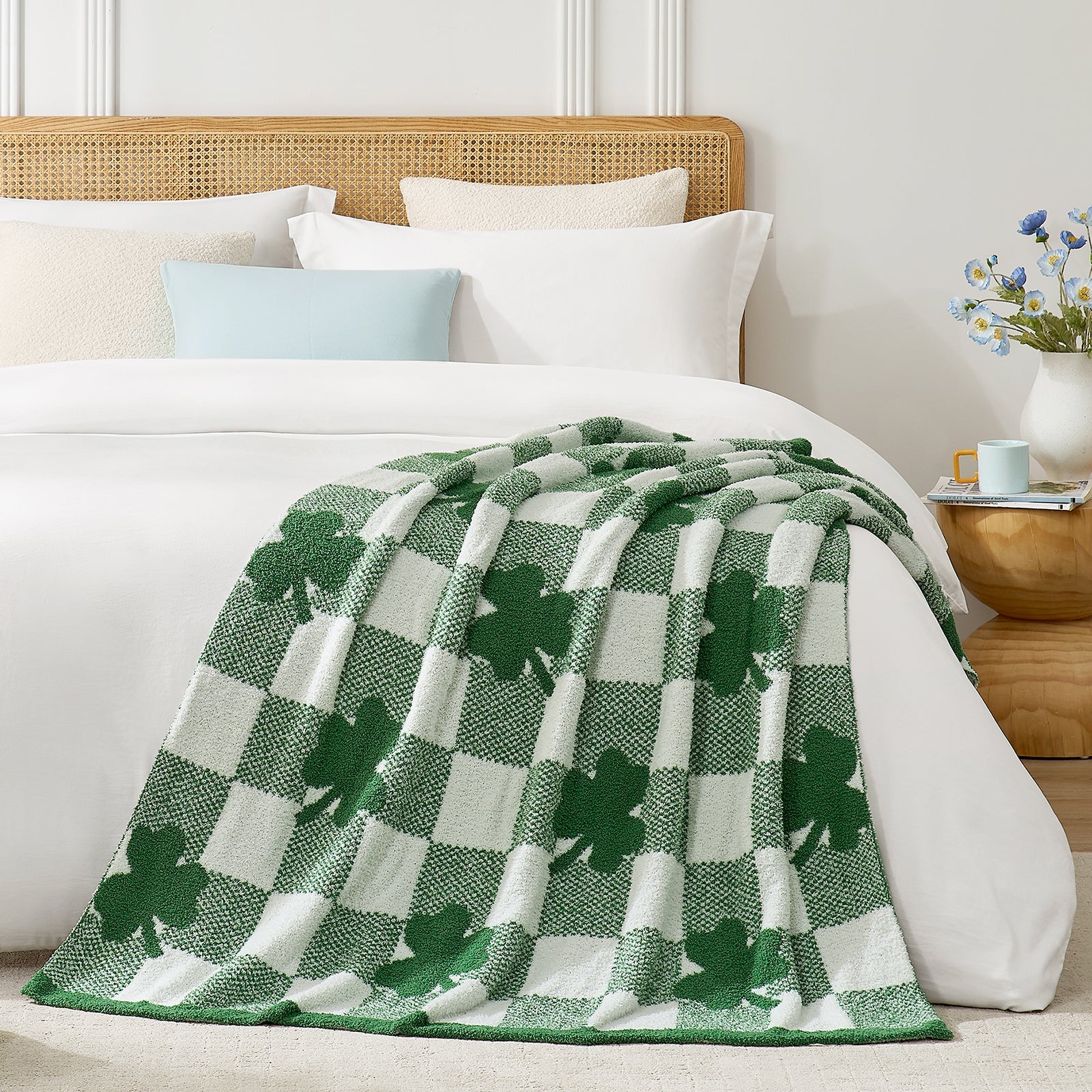 Green and white checkered blanket with shamrock pattern on a bed #color_Lucky Clover