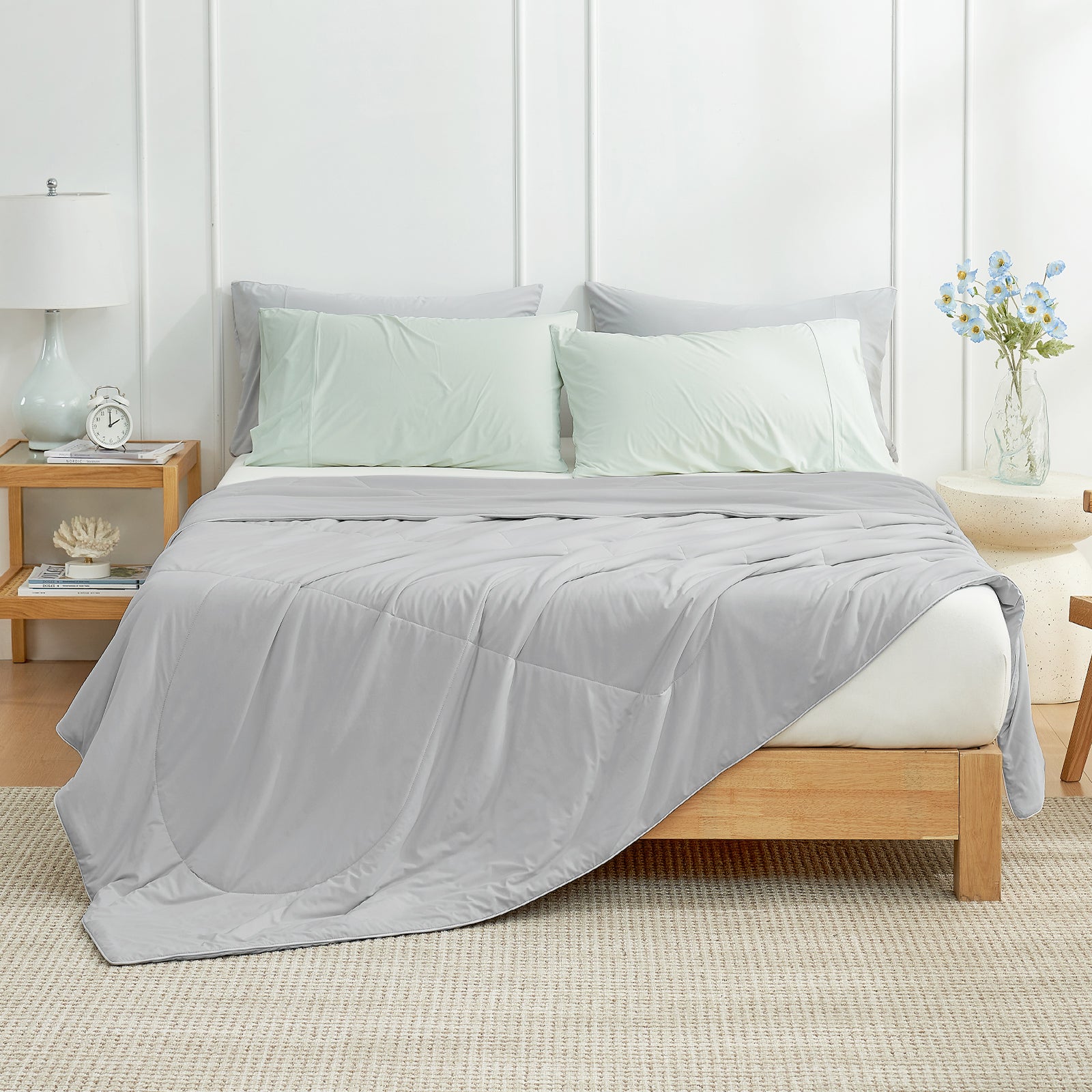 Cozy Bliss grey cooling blanket on bed, modern bedroom. #Color_Light Grey