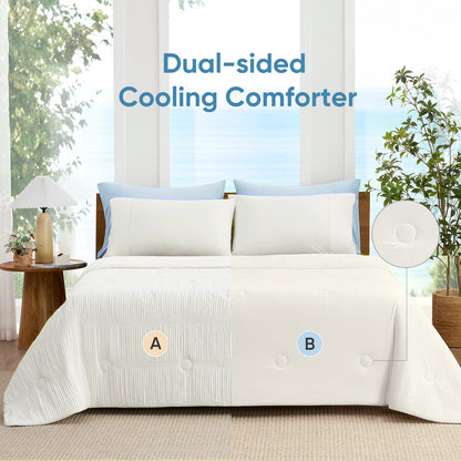 Full bed view of cooling comforter with reversible dual-sided design, showing cooling and breathable sides.#color_Off White