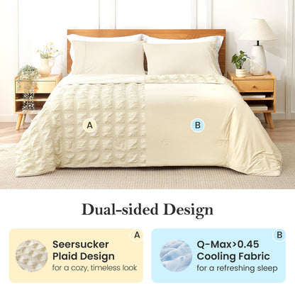 Beige comforter on a bed with dual-sided design features highlighted #color_Beige