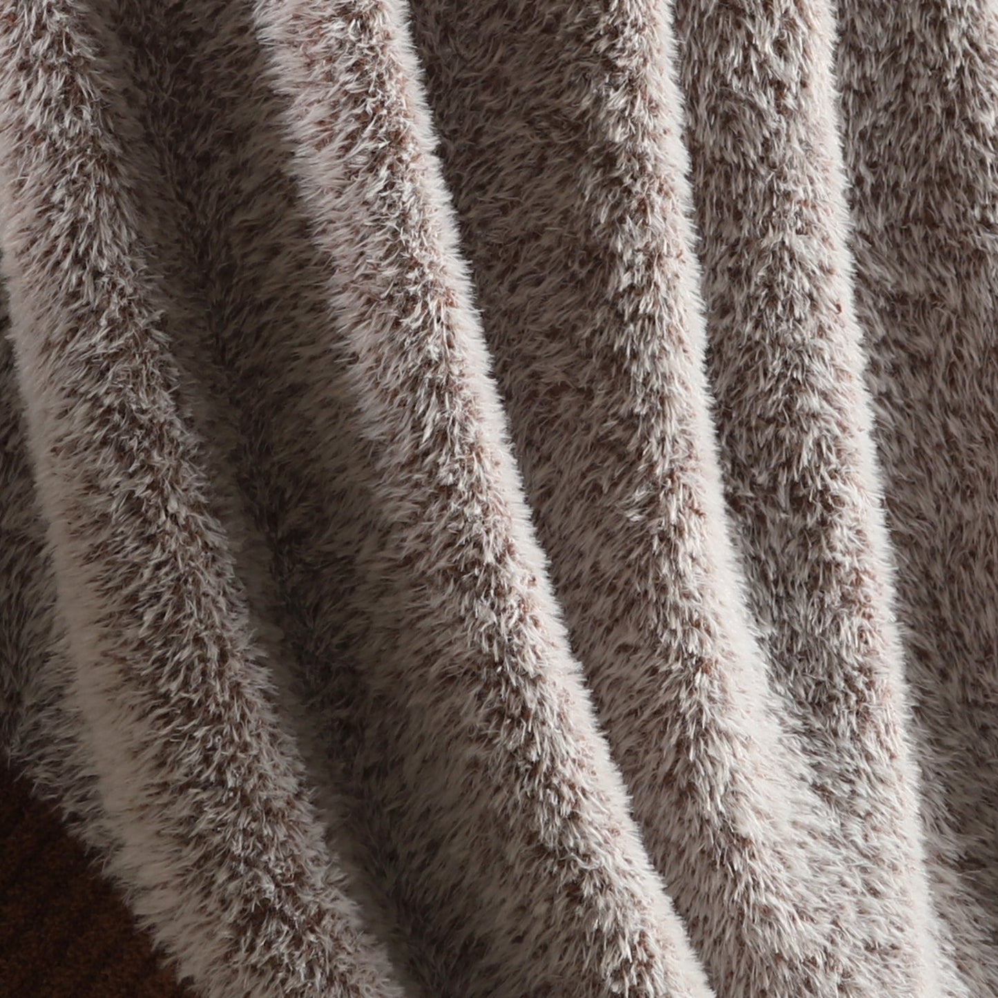 Close-up of faux mink texture on Faux Mink Feather Knit Throw Blanket in Brown highlighting soft plush fibers and cozy feel. #color_Brown