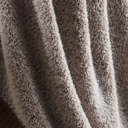 Close-up of faux mink texture on Faux Mink Feather Knit Throw Blanket in Brown highlighting soft plush fibers and cozy feel. #color_Brown