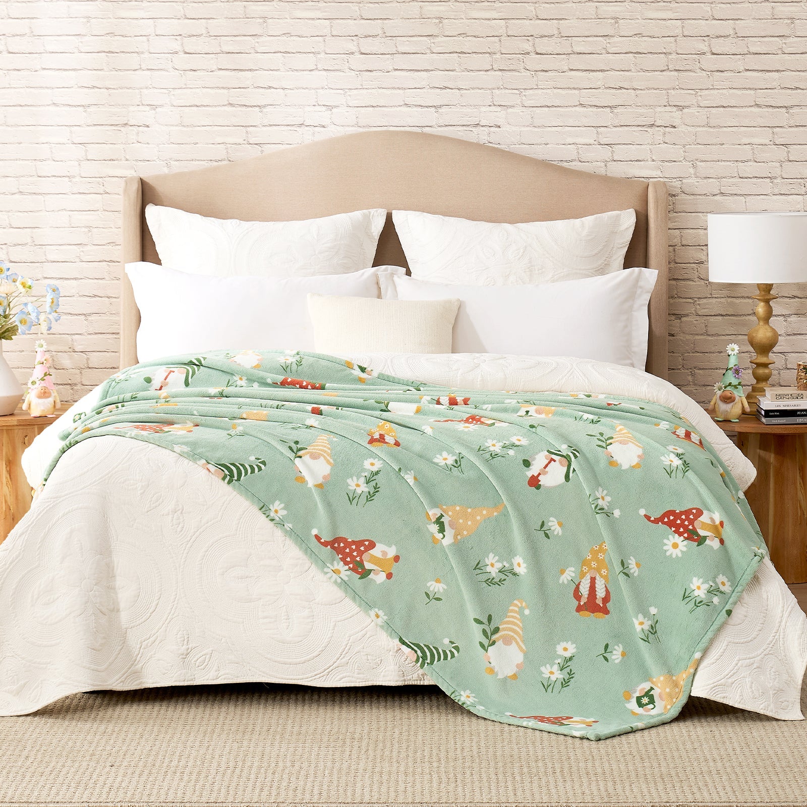 Spring gnomes milkyplush throw blanket in Green layered on a bed, creating a warm and playful bedroom look #color_Green