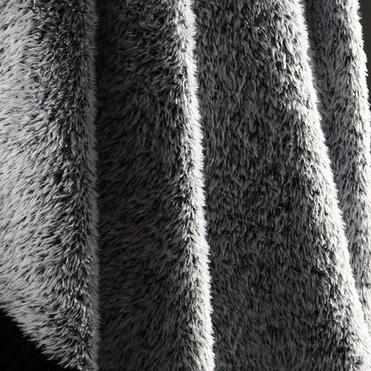 Macro close-up of faux mink fibers on Faux Mink Feather Knit Throw Blanket in Black showcasing ultra soft and fluffy texture detail. #color_Black