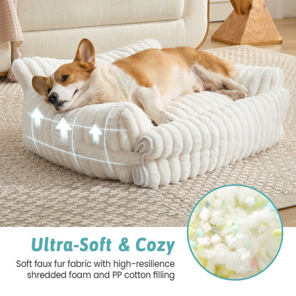 Dog on plush pet bed with on-screen text emphasizing soft faux fur and premium filling for cozy sleeping.#color_Cream White