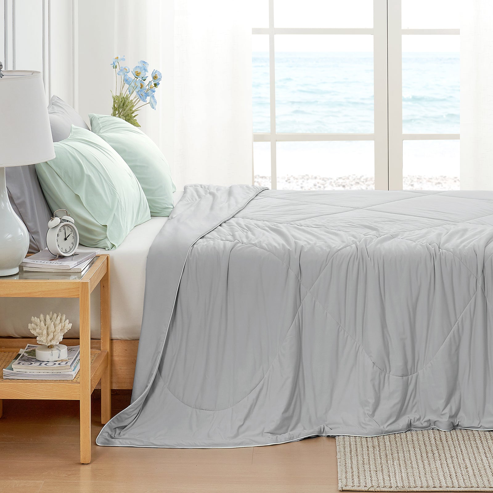 Cozy Bliss grey cooling blanket in bedroom, ocean view #Color_Light Grey