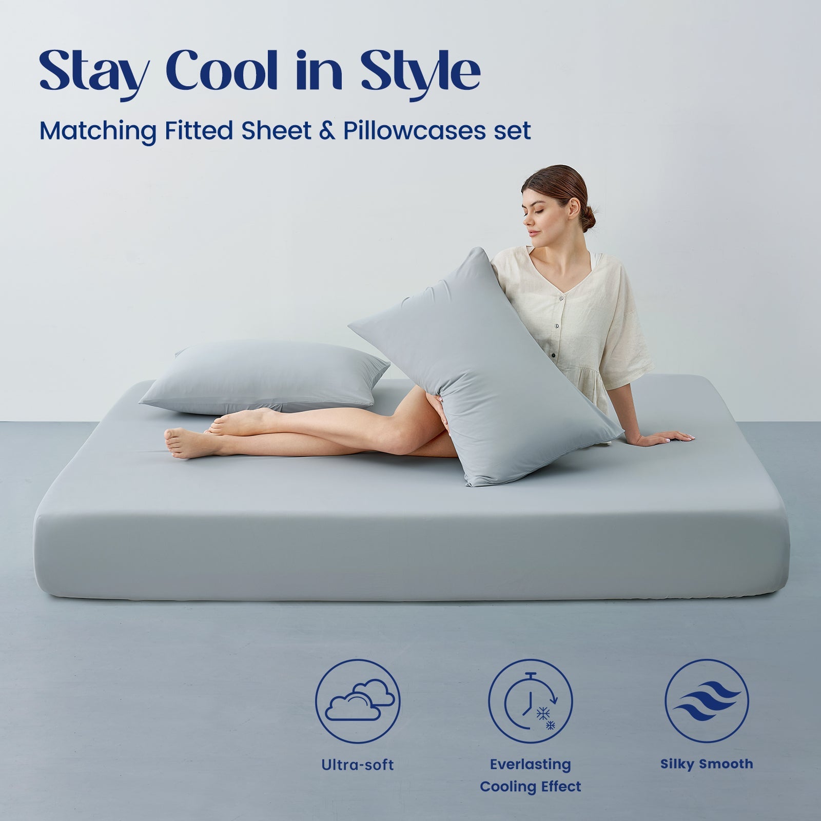 Woman lying on a cooling sheet set   with matching fitted sheet and pillowcases set.#color_Light Grey