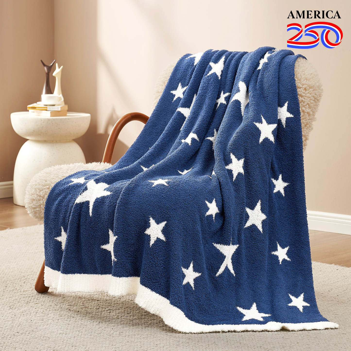 Reversible Star Feather Yarn Knit Throw Blanket in Heather Royal Blue draped over an armchair, showcasing its ultra soft texture and stylish star pattern design. #color_Heather Royal Blue