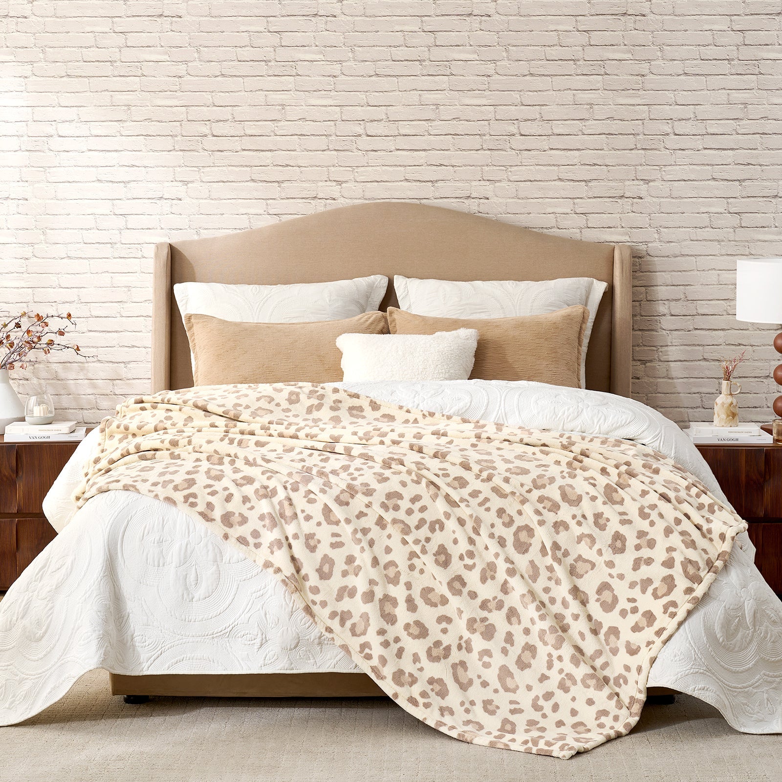 Leopard print milkyplush throw blanket in Khaki Leopard layered on a bed, creating a warm and stylish bedroom look #color_Khaki Leopard
