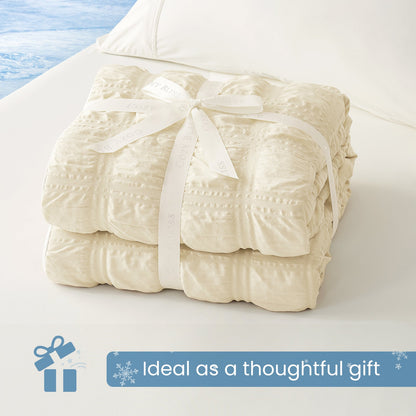 Cozy Bliss beige cooling blanket gift wrapped for special occasions, soft and cozy present idea.#color_Beige