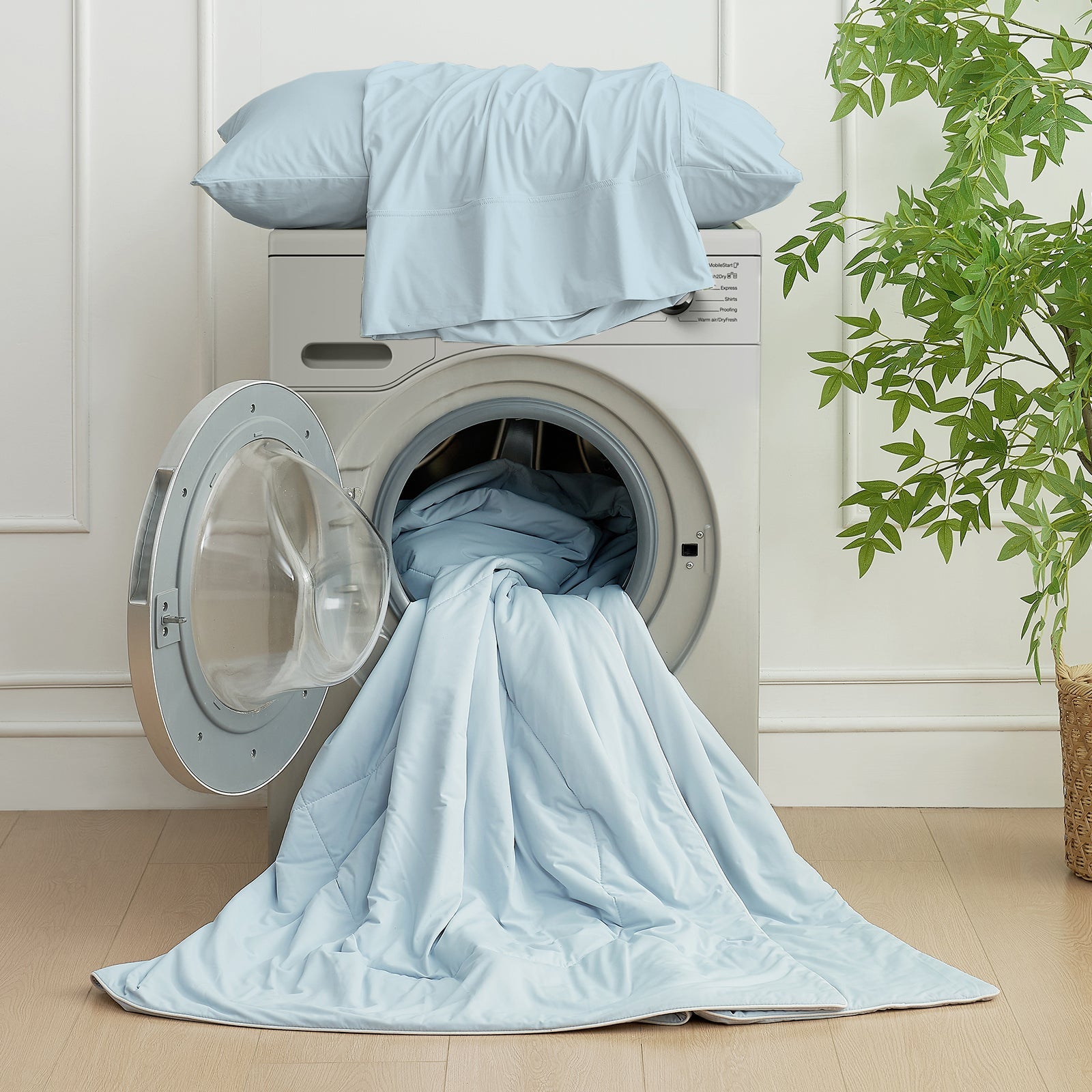 Cozy Bliss cooling blanketand bedding set in washing machine, machine washable #Color_Cool Blue