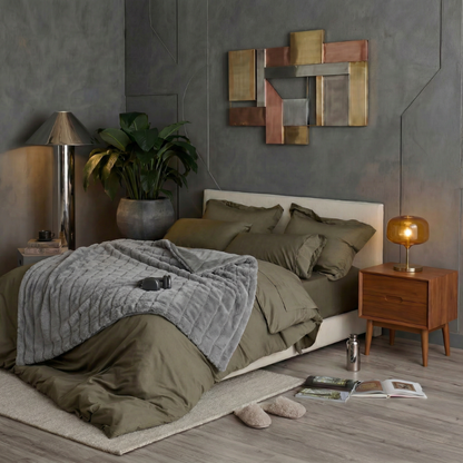 Cozy Bliss faux fur blanket styled on a modern bed, creating a cozy and moody bedroom atmosphere #color_Grey