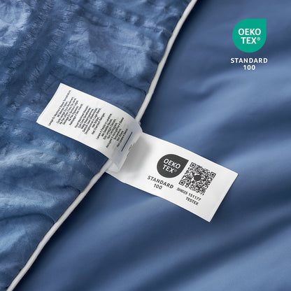 OEKO-TEX label on a blue fabric background #color_Dark Blue