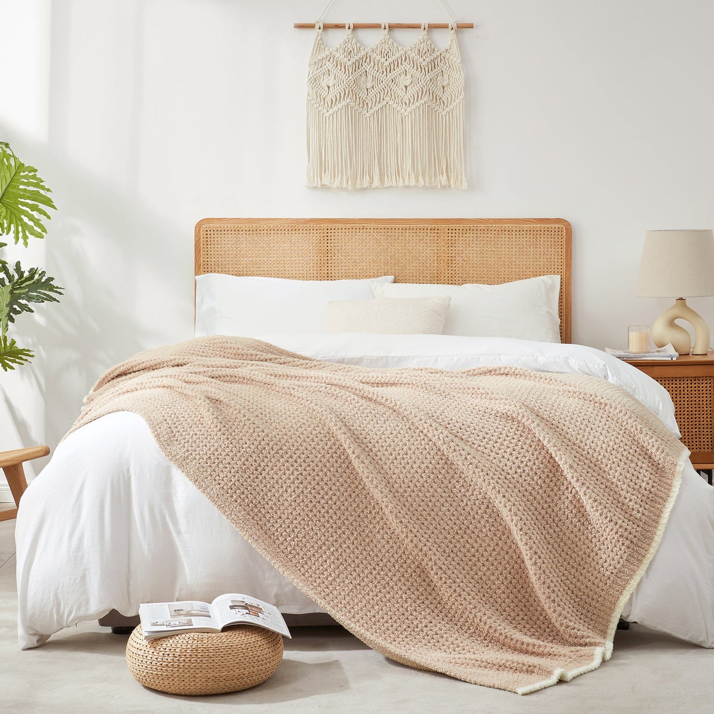 Soft Waffle Feather Yarn Throw Blanket in Beige styled on a bed, adding a warm and elegant layered look. #color_Beige