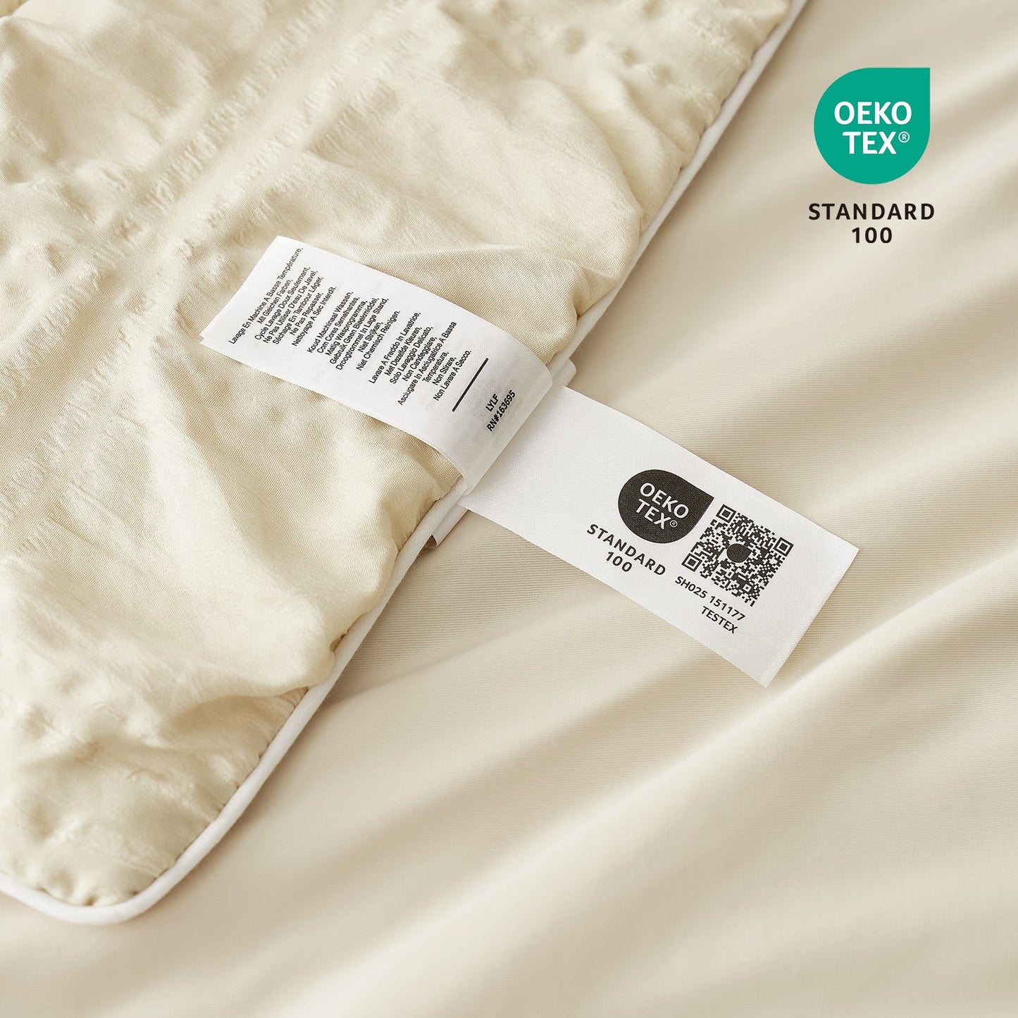 Close-up of a label on a beige fabric with OEKO-TEX Standard 100 certification. #color_Beige