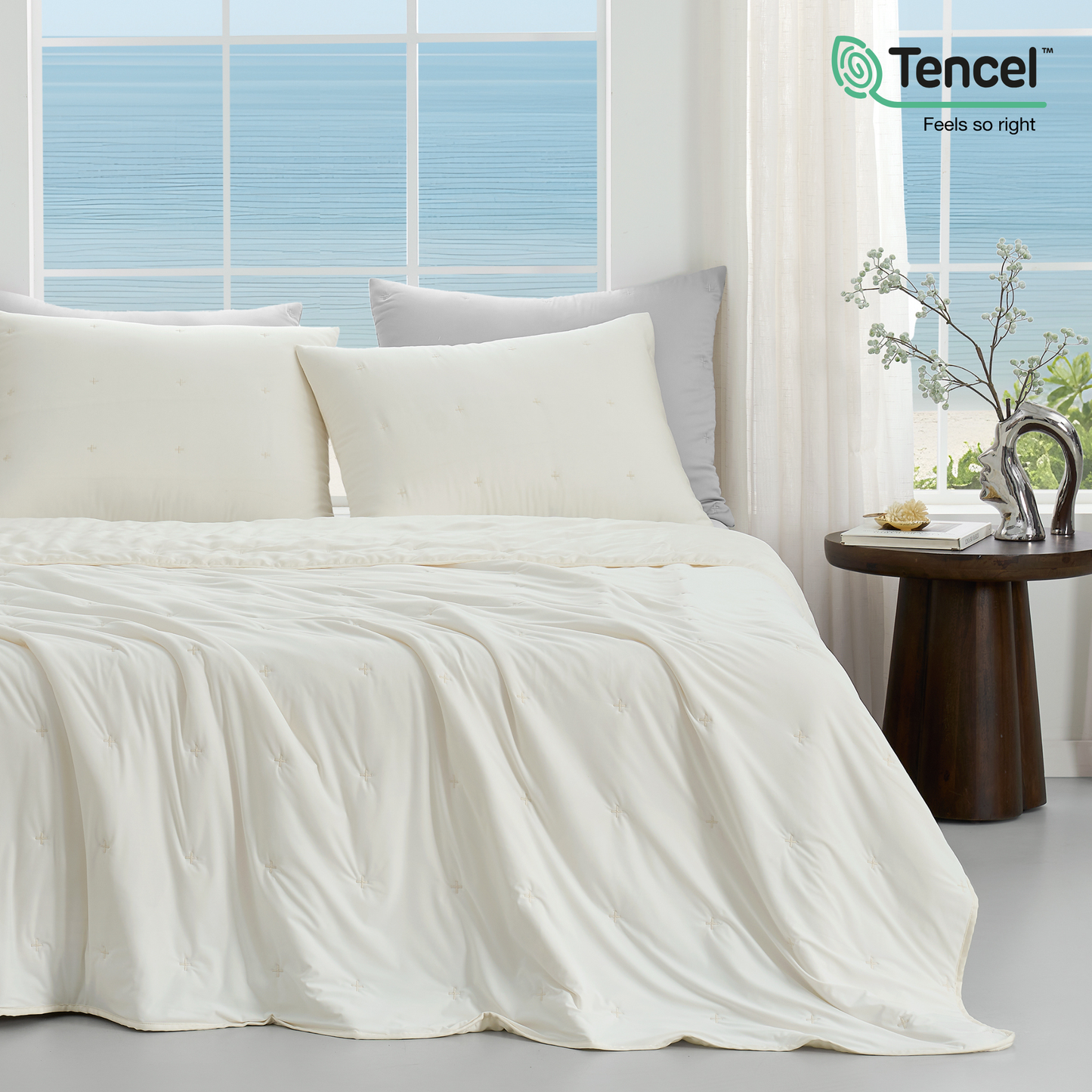 Luxurious Tencel™ Lyocell Cooling Comforter in white front view.#Color_Off White