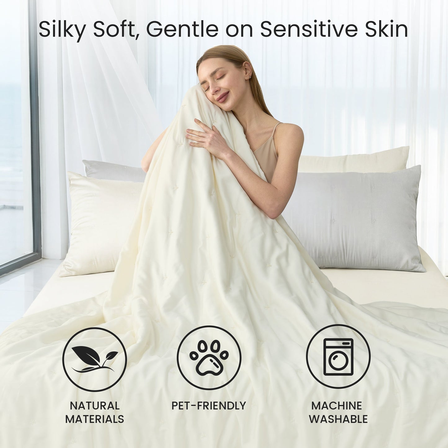 Tencel™ Lyocell cooling comforter, silky soft, skin-friendly and breathable, woman enjoying gentle comfort in bed.#Color_Off White