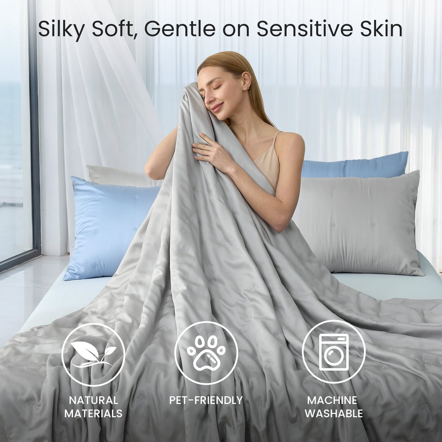 Tencel™ Lyocell cooling comforter, silky soft, skin-friendly and breathable, woman enjoying gentle comfort in bed.#Color_Grey