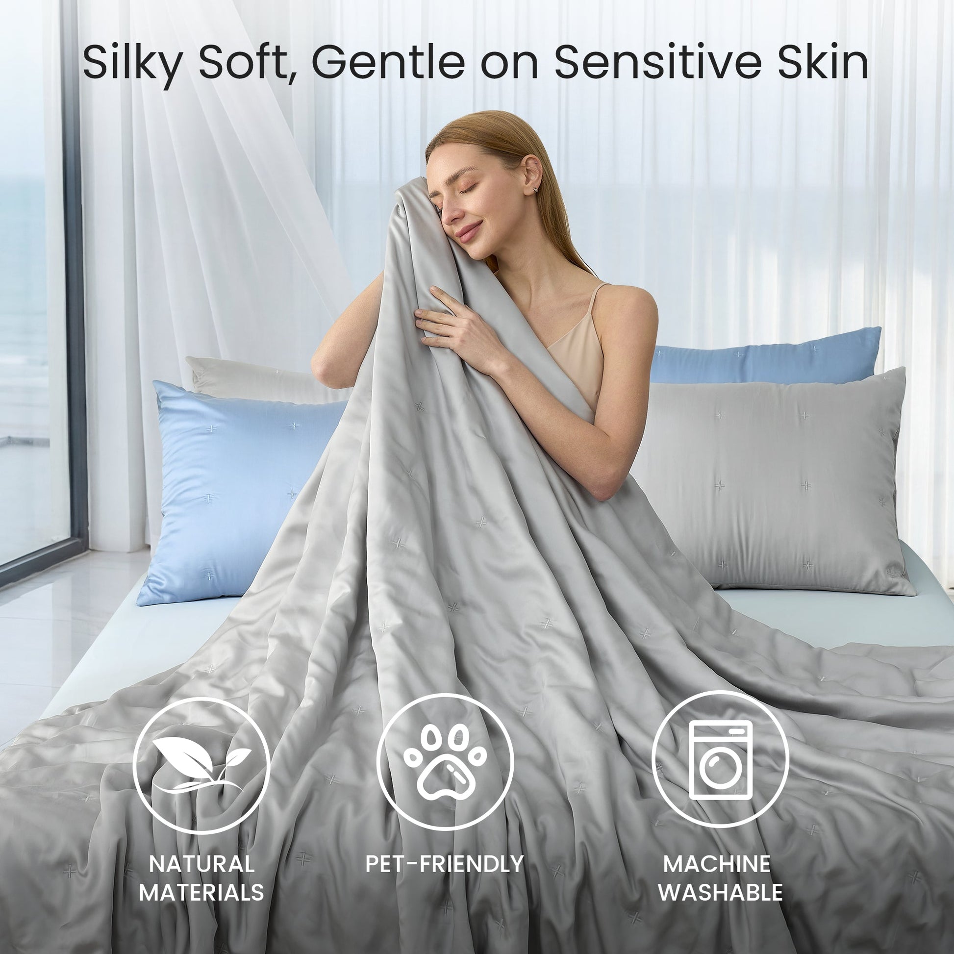 Tencel™ Lyocell cooling comforter, silky soft, skin-friendly and breathable, woman enjoying gentle comfort in bed.#Color_Grey