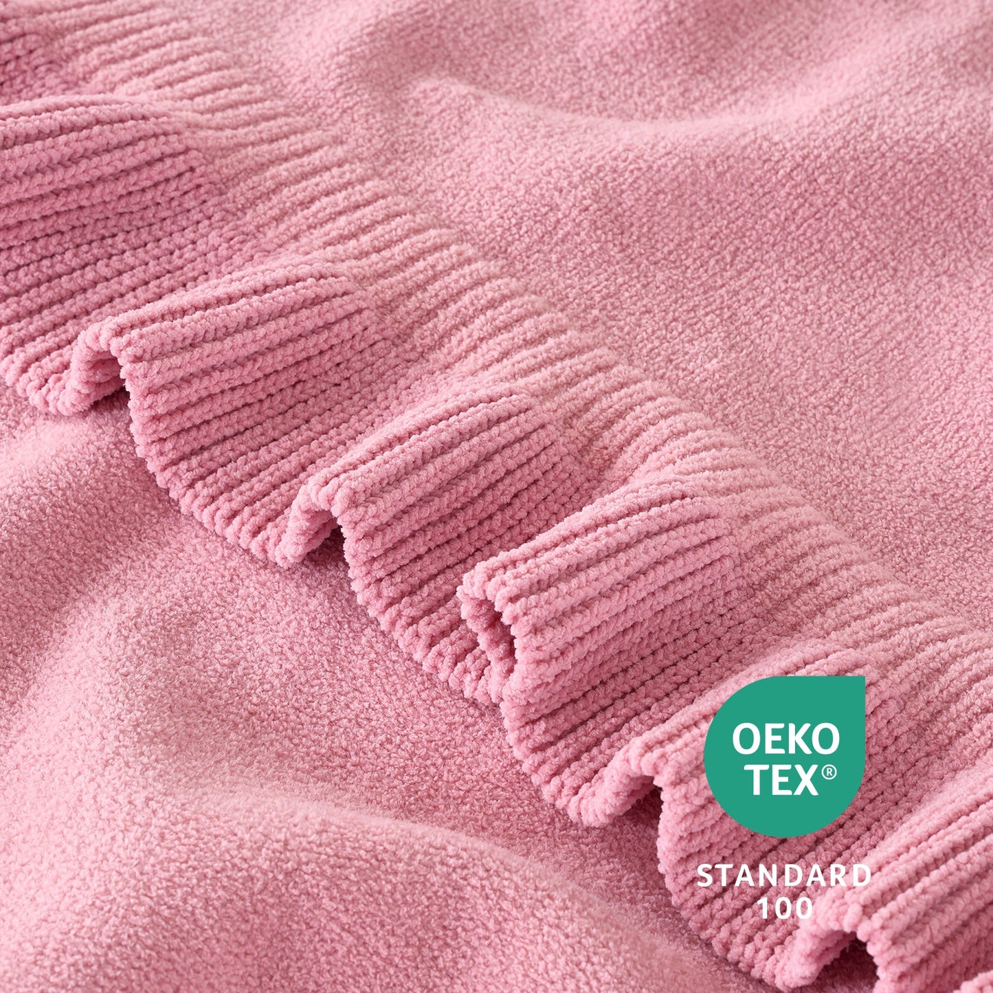 Close-up of ruffle edge on Ruffle Knit Chenille Throw Blanket in Pink with OEKO-TEX STANDARD 100 certification, highlighting soft texture and skin-friendly fabric. #color_Pink