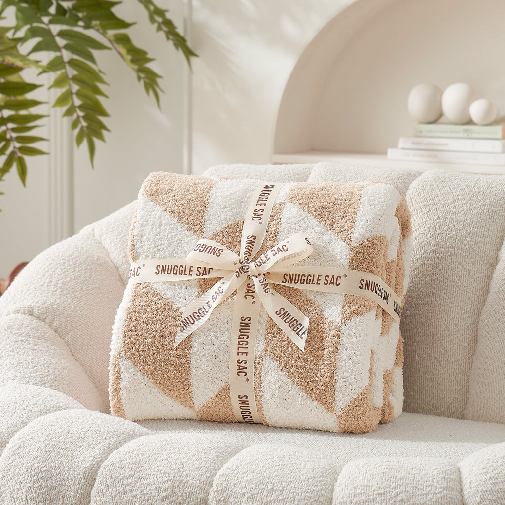 Chevron Feather Yarn Knit Throw Blanket in Beige neatly folded with ribbon packaging, perfect as a cozy gift for holidays and special occasions. #color_Beige