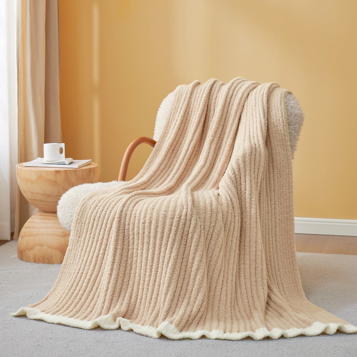 Soft Ribbed Feather Yarn Throw Blanket in Beige draped over an armchair, showcasing ribbed texture and soft feather yarn design. #Color_Beige