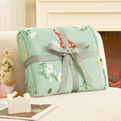 Spring gnomes milkyplush throw blanket in Green folded with ribbon, perfect for gifting #color_Green