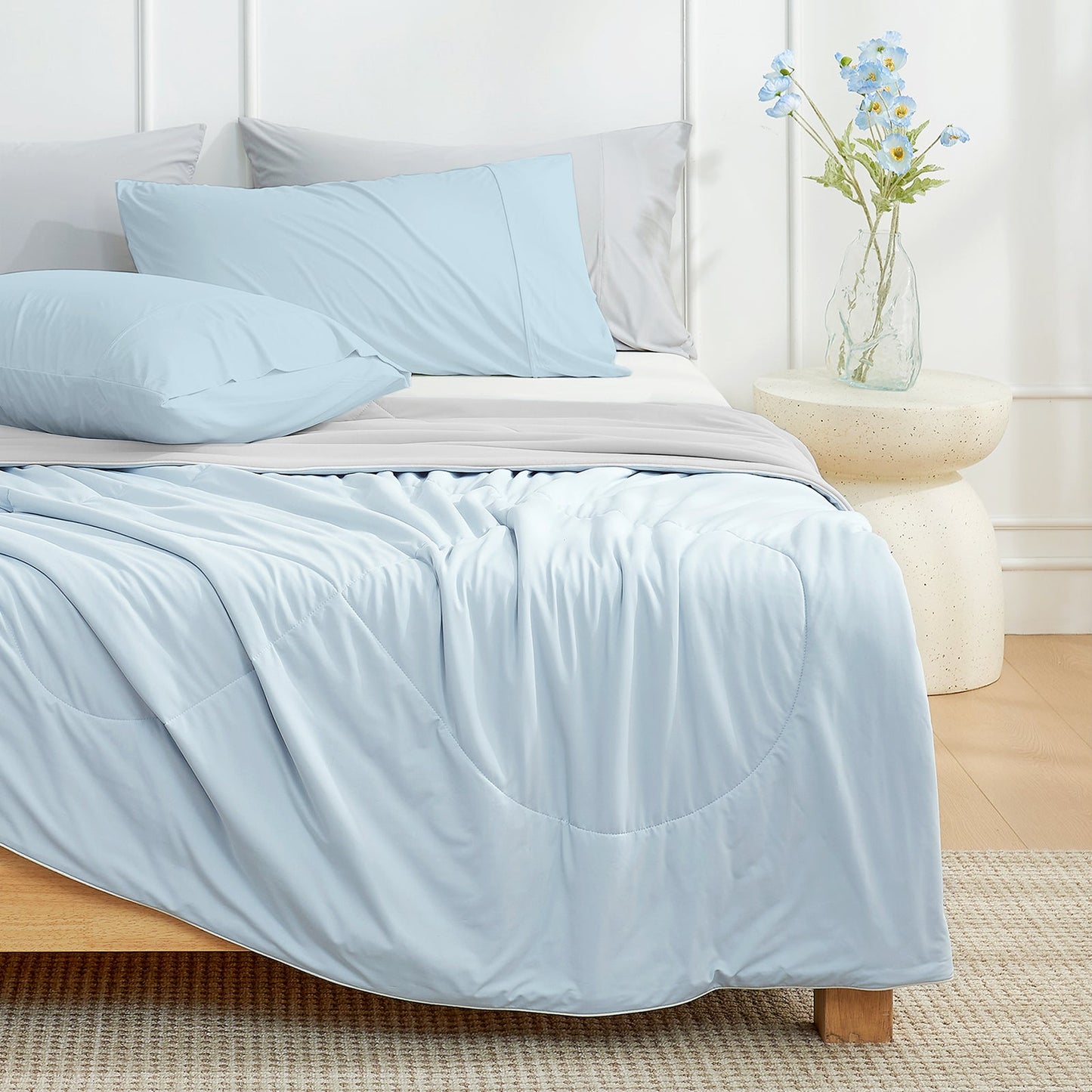 Grey and blue Cozy Bliss cooling comforter on bed, soft breathable dual-tone reversible bedding #Color_Grey/Blue