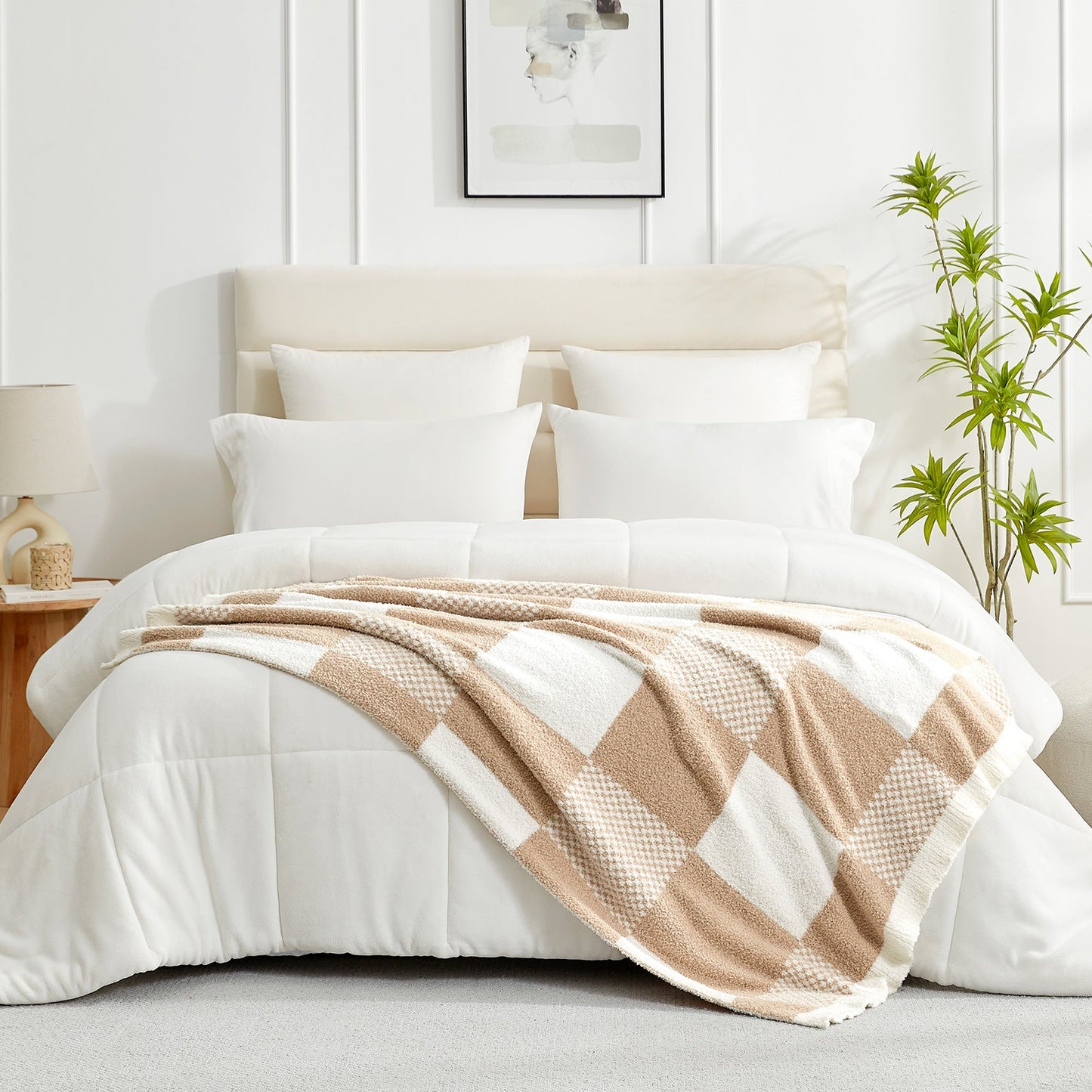 Checkered Feather Yarn Throw Blanket in Beige styled on a bed, adding a warm and elegant layered look. #color_Beige