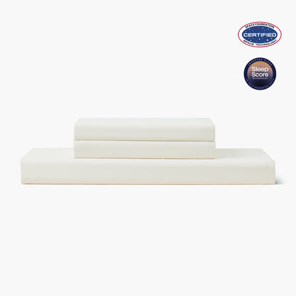 White bed sheets set with Space Foundation and Sleep Score certification logo on a white background#color_Ivory