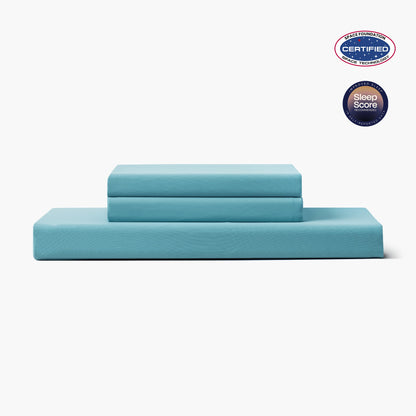 Blue bed sheets set with Space Foundation and Sleep Score certification logo on a white background#color_Dream Blue