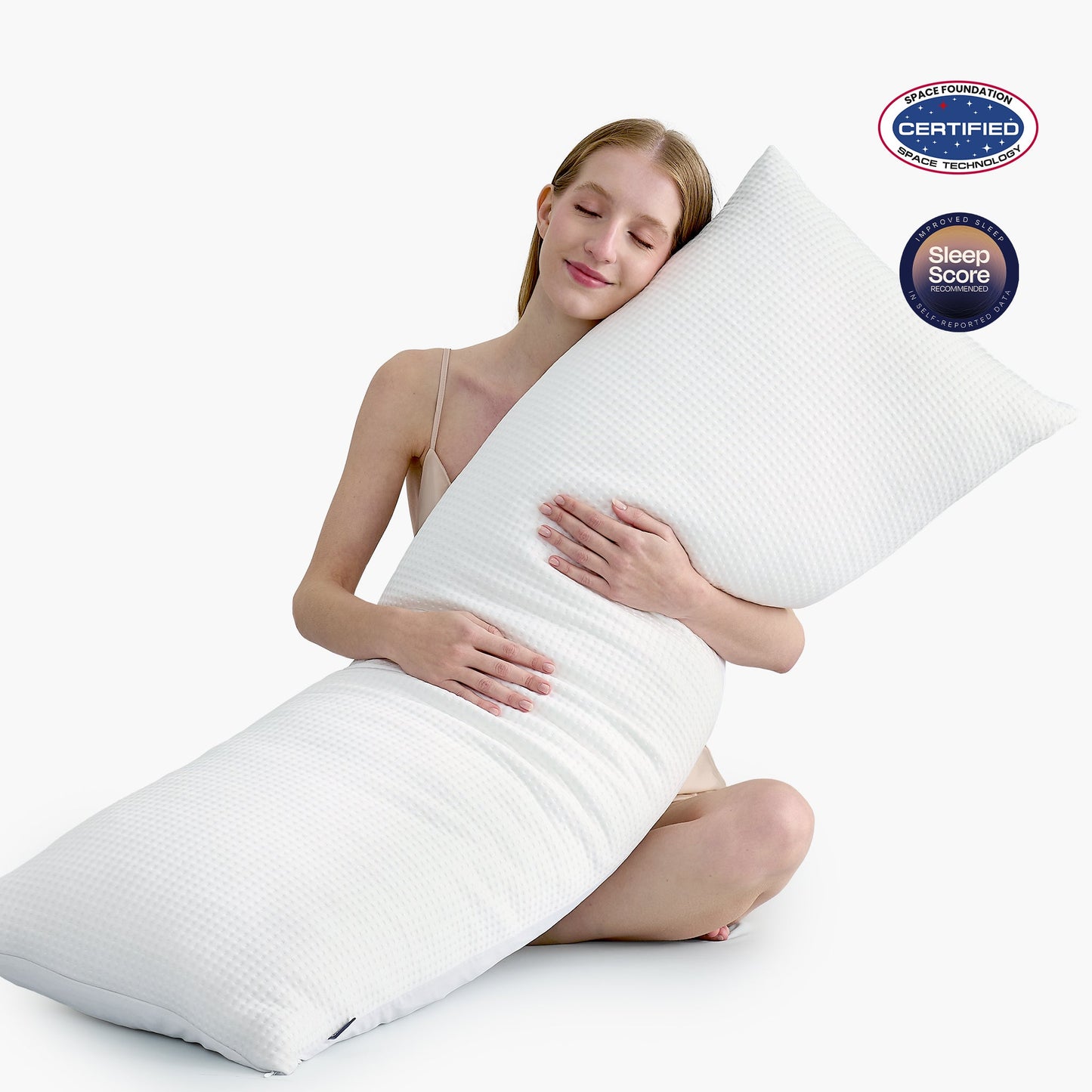 Women hugging body pillow with space station and sleep score certifications. #color_Off White